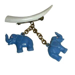 Vintage Brooch Plastic Celluloid Blue Elephants Hanging from Plastic Tusk